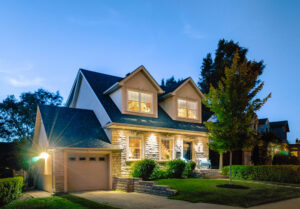 Facade of a house with bright lights.